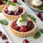 mini cherry tarts with golden crusts
