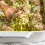 Pesto Baked Turkey Meatballs Close Up Cheesy 150x150 1