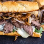 Steak Sandwich with Caramelized Onions Havarti 150x150 1